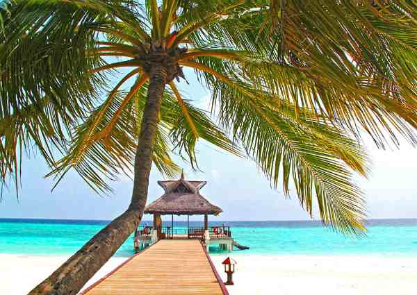 A pristine beach with blue waters in Thailand