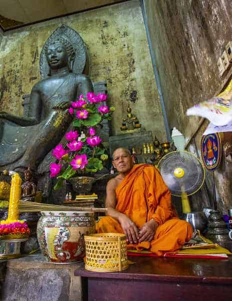 Ayutthaya Buddhist monk sitting inside temple